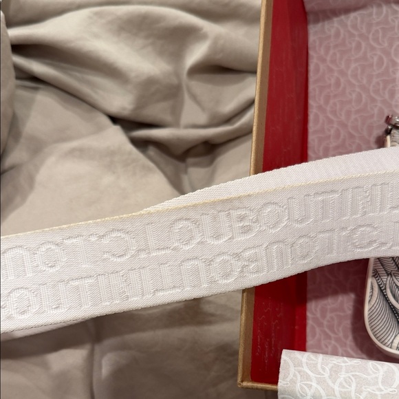 CHRISTIAN LOUBOUTIN LOUBILA HYBRID MONOGRAM
POUCH CROSSBODY BAG IN WHITE/BLACK - Picture 2 of 8